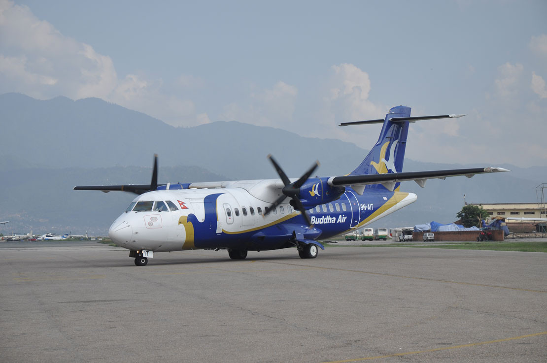 Buddha Air ATR 72 aircraft at Kathmandu airport for a mountain flight